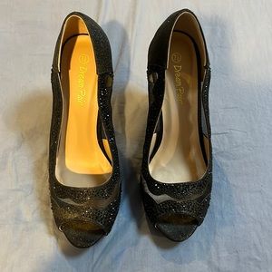 Black sparkle and lace high heels.